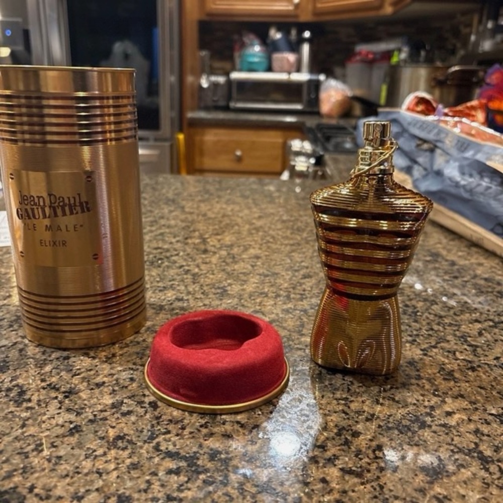 Jean Paul Gaultier Gold and Red Striped Bottle